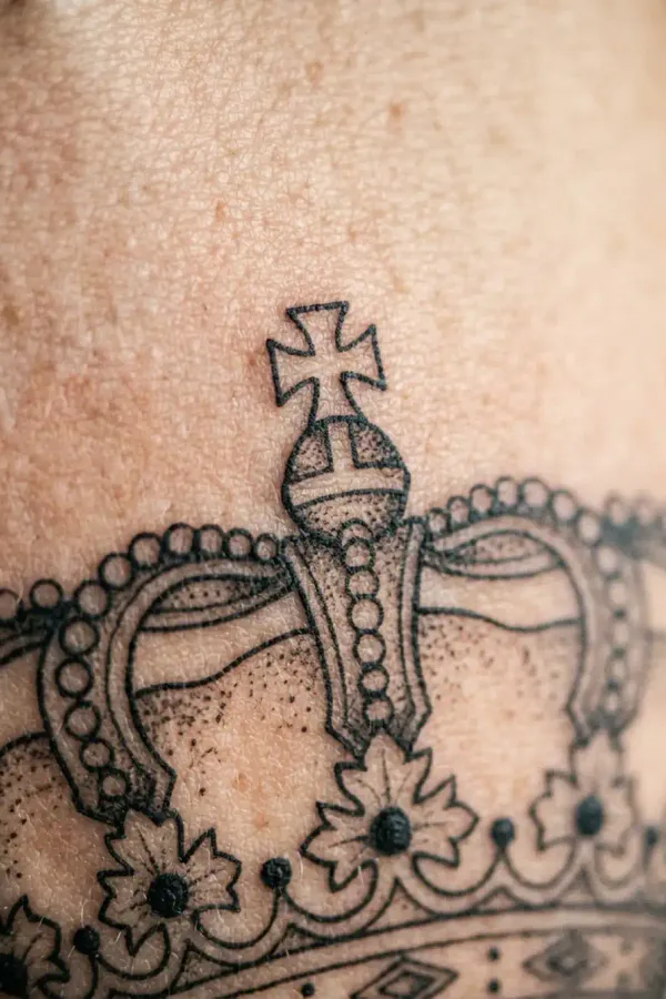 King and queen tattoo, macro shot of the crown details
