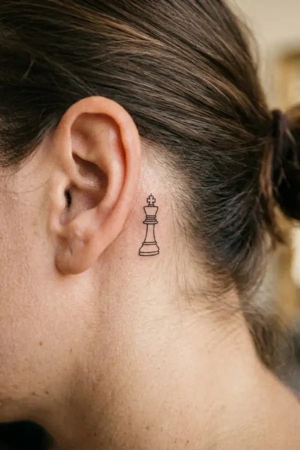 Chess tattoo behind the ear, lifestyle shot