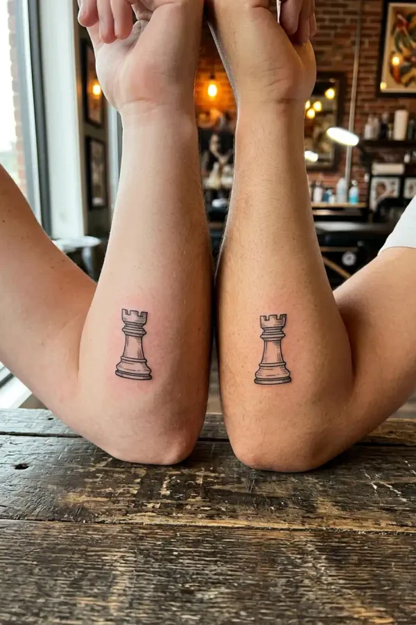 Two rook tattoos as a sibling motif